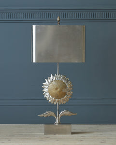 bronze sunflower shaped table lamp with an oblong shade