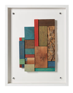 composition of coloured wooden blocks on clear perspex