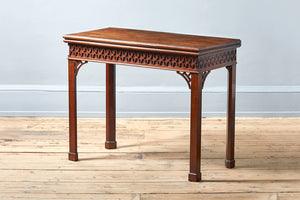 rectangular mahogany table with a folding top